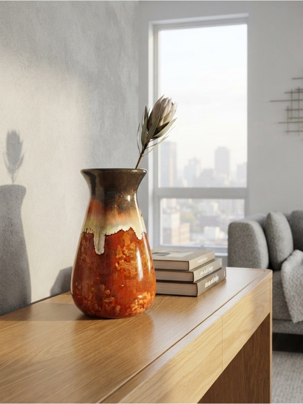 Art pottery vase with brown drip glaze